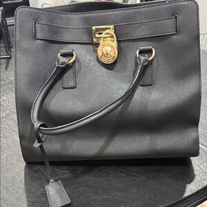 Michael Kors Black Satchel with Gold Accents